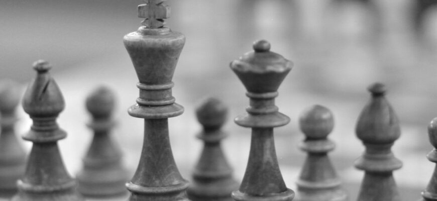 a black and white photo of a chess board