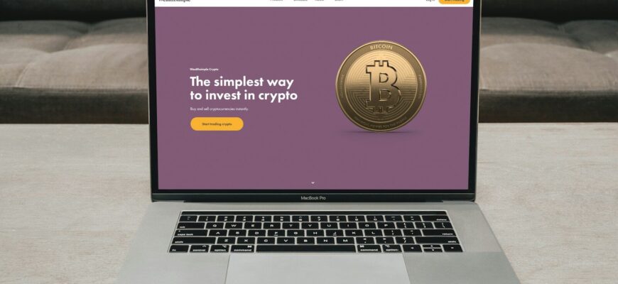 a laptop computer sitting on top of a table